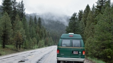 van on side of road foggy