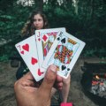 play-card-game-outside-campfire
