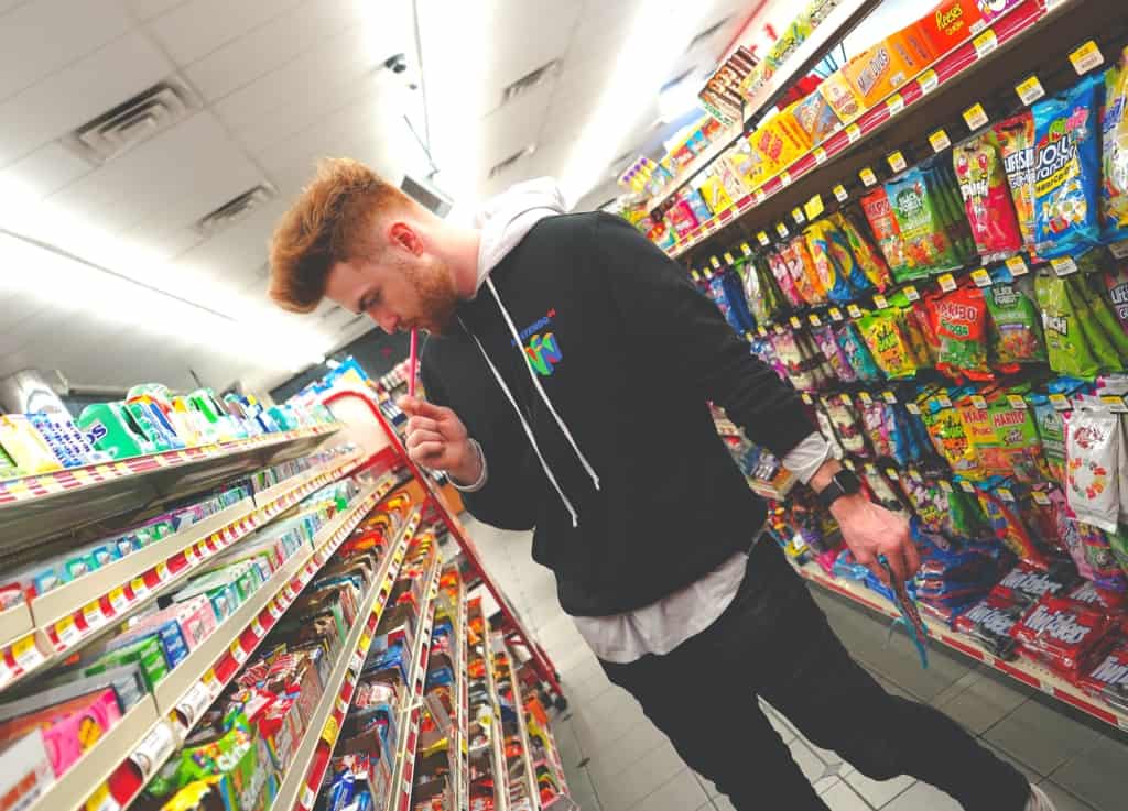 guy-in-convenience-store-aisle
