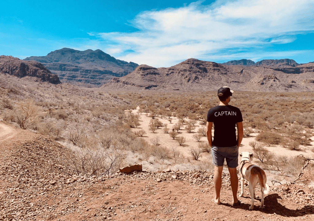 camping-in-mexico-man-and-dog-walking