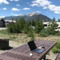 how-to-pay-taxes-as-digital-nomad-laptop-on-picnic-table