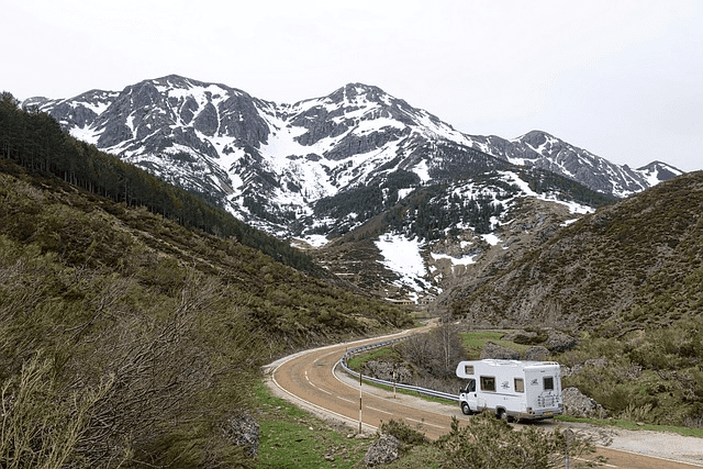 rv-driving-down-dirt-road