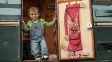 vanlife-with-kids-toddler-standing-in-van-doorway