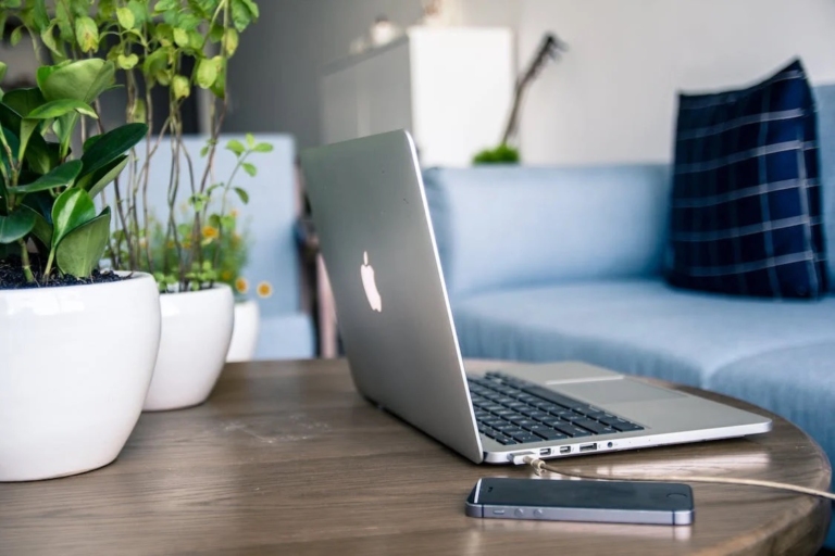 laptop-sitting-on-desk-at-home Large