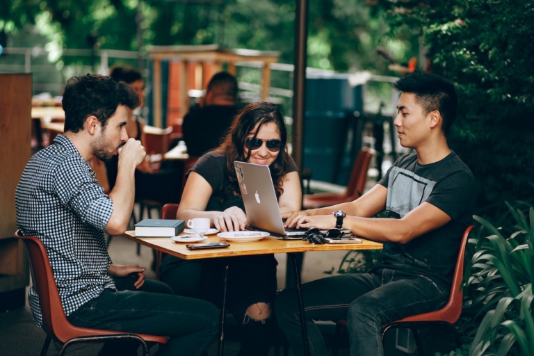 nomads-working-on-laptops-at-coffee-shop