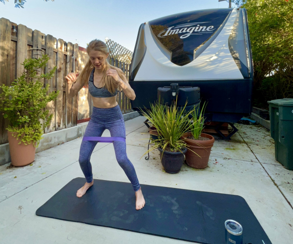 woman-working-out-near-rv-outdoors