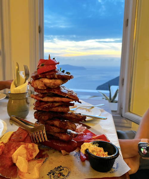 Mama Thira Taverna meat tower dinner overlook sunset